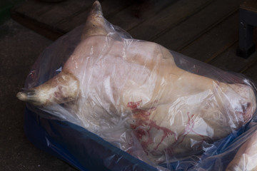 raw cow's head on the street market