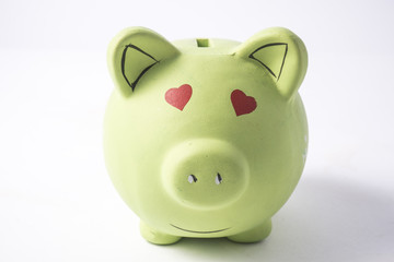 green piggy bank isolated on white background