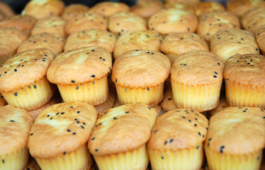 close up on fresh baked cakes in pile