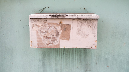 Wooden white mailbox close up