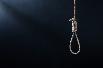the noose against the glum background, homicide or commit suicide concept
