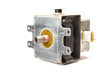 Used magnetron unit from microwave oven on white background