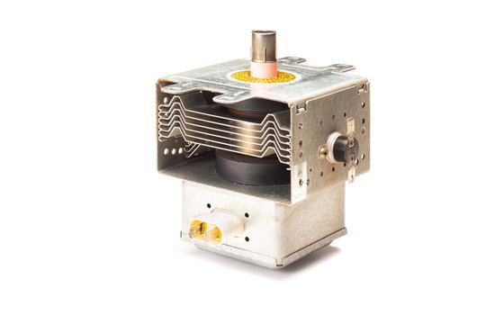 Used magnetron unit from microwave oven on white background