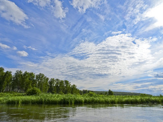 Summer landscape with quiet river in a good Sunny weather