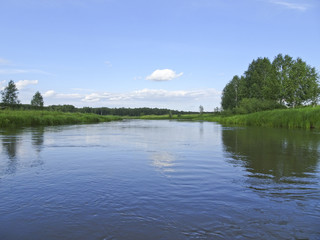 Fototapeta na wymiar Summer landscape with quiet river in a good Sunny weather