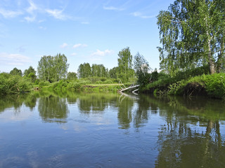 Summer landscape with quiet river in a good Sunny weather