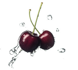 Fresh and juicy cherry fruit served in a splash of water