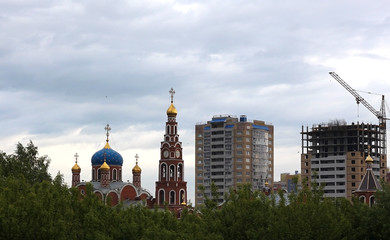 Russian city landscape Christian Church and new building