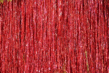 The curtain of shiny tinsel.