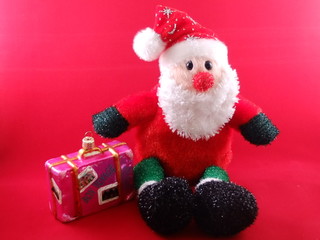 Weihnachtsmann mit kofferschen,  bon voyage
