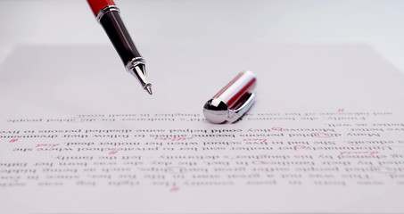 proofreading paper on table