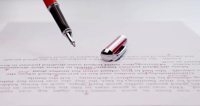 proofreading paper on table