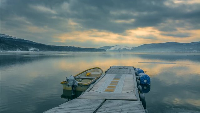 4k Timelapse Sunrise Scene of Small Fishing Port at Yamanashi Lake with mt. Fuji is Background, Winter Japan