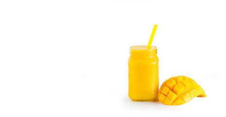 Yellow Mango juice In a glass And mango isolated background
