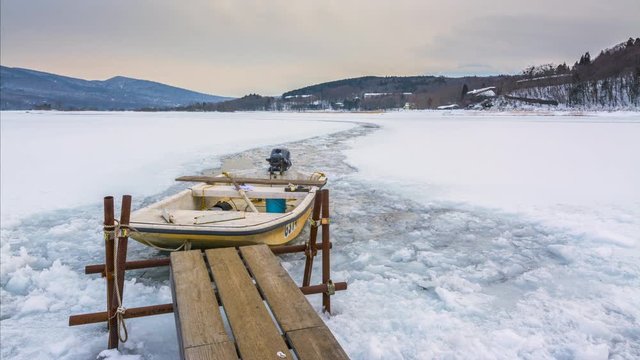 4k Timelapse Sunrise Scene of Small Fishing Port at Yamanashi Lake with mt. Fuji is Background, Winter Japan