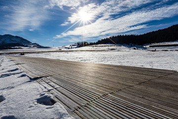 "  The frozen Sailimu lake with snow mountain background at Yili, Xinjiang of China"