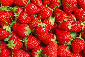 Fresh ripe strawberries as background, top view