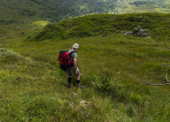 Fototapeta na wymiar mature hiker, vitality walking in nature, Europe travel