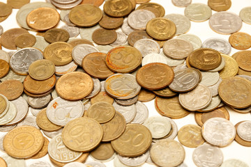 The texture of Russian coins, a large number of coins, Russian rubles and kopecks.
