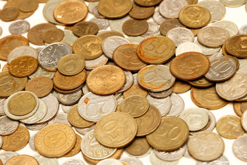 The texture of Russian coins, a large number of coins, Russian rubles and kopecks.