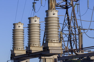 huge ceramic insulators on high-voltage power lines