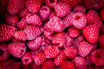 Fresh raspberries background closeup photo