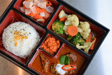 Rice with beef curry in bento - creative dish