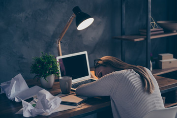 Portrait of sleepy bored accountant sleeping on keyboard sitting at desktop in work place station...