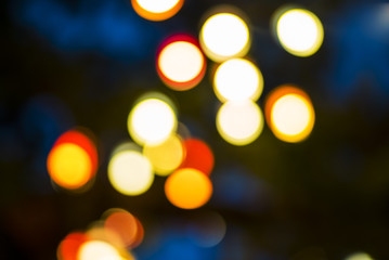 Obraz premium Abstract colored bokeh background, new year and celebration nights