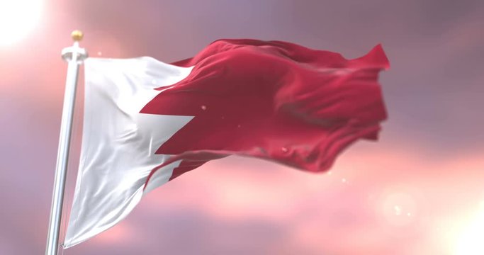 Bahrain flag waving at wind in slow at sunset, loop