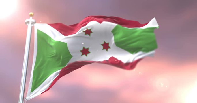 Burundi flag waving at wind in slow at sunset, loop