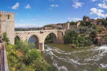 Fototapeta premium Puente de San Martin (St Martin's Bridge) across the River Tagus in Toledo, Spain