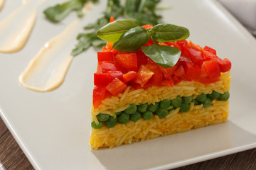 Healthy food. Rise basmati with vegetables. Vegan food. Basmati rice cooked white on wooden table.