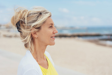 Attractive serious blond woman profile portrait