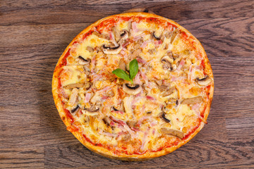 Pizza with ham and mushrooms