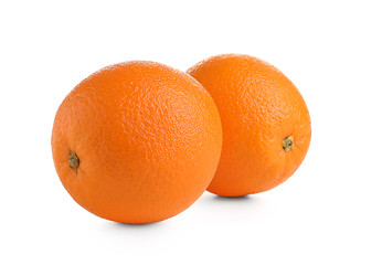 Ripe oranges on white background. Fresh citrus fruit