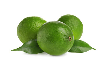 Fototapeta na wymiar Ripe limes on white background. Fresh citrus fruit