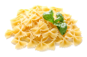 Heap of raw Farfalle pasta on white background