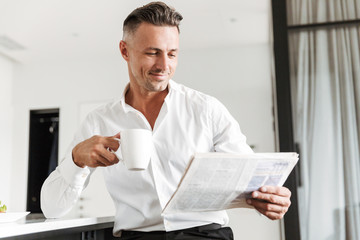 Happy man dressed in formal clothes