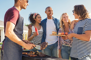 Friends enjoying lunch barbecue