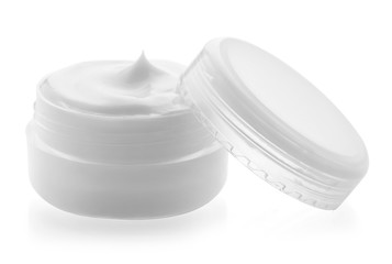 Jar with cream on white background. Skin care cosmetics