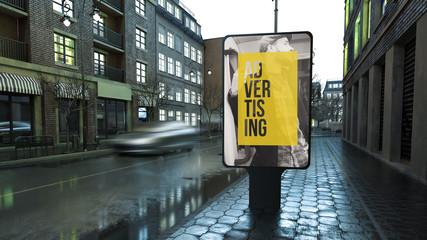 advertising billboard on city street at evening