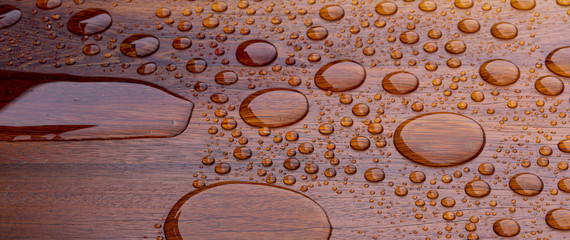 Wooden planks bathed in the rain