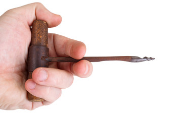 Vintage wooden drill in hand