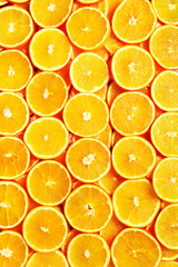 Creative pattern. Fresh sliced orange fruit texture. Macro, top view with copy space. Food frame. Juicy oranges background. banner