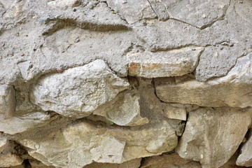 masonry stone wall of large stone limestone
