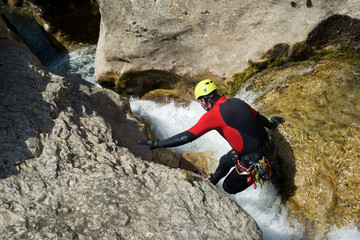 Canyoning in Gorgonchon Canyon, Spain.