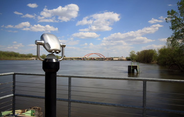 Binoculars overlooking the Mississippi River with the Hastings bridge in background in Hastings,...