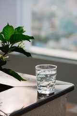 Closeup Glass of water on table nature background