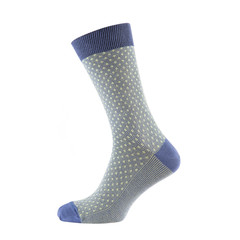 one colored sock is standing on a shape, the shape is not visible, on a white background is isolated